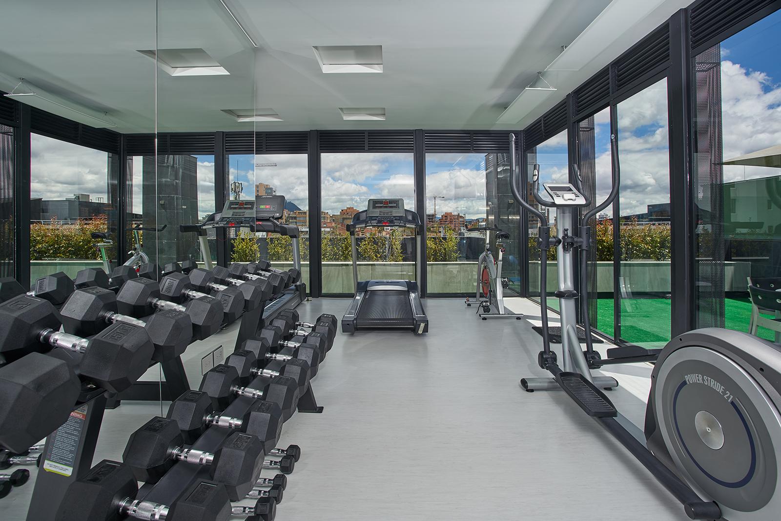 Hotel 100 Luxury Suites By Preferred Богота Екстериор снимка The gym at the top of the building